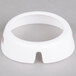 A white plastic Tablecraft salad dressing dispenser collar with maroon text.