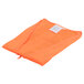 A medium orange mesh safety vest with white accents.