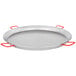 A large silver Matfer Bourgeat carbon steel paella pan with red handles.