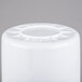 A white plastic container with a circular lid.