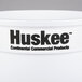 A white Continental round trash can with black Huskee text.