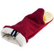A red and yellow San Jamar Cool Touch Flame oven mitt with a white lining.