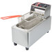 A Cecilware stainless steel electric countertop deep fryer with a basket inside.