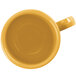A GET Tropical Yellow Tritan Mug with a handle on a white background.