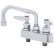 A T&S chrome deck-mounted workboard faucet with two handles and an 8" swing nozzle.