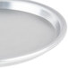 An American Metalcraft aluminum pizza pan with a silver rim.