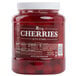A jar of Regal Maraschino Cherries with stems and a white label.