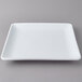 An American Metalcraft white square stoneware platter with a small rim.