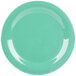 A close-up of a green plate with a white narrow rim.