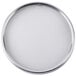 A round white object with a silver rim.