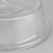 A clear Carlisle polycarbonate plate cover over a stack of plates.