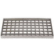 A Cooking Performance Group metal bottom grate with holes.