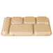 A beige plastic tray with six square compartments.
