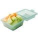 A customizable jade green plastic container filled with fruit.