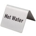 A Tablecraft stainless steel tent sign that says "Hot Water" on a counter.