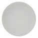 A white Libbey Driftwood satin matte porcelain coupe plate with speckled texture.
