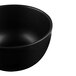 A close-up of a black Libbey Driftstone bowl with a satin matte finish.