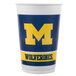 A white Creative Converting plastic cup with a yellow and blue University of Michigan logo.