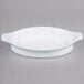 A white oval Libbey Reflections porcelain rarebit dish with handles.
