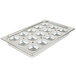 A Vollrath metal tray with six egg-sized holes in it.