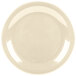 A tan melamine pie plate with a white rim.