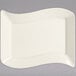A Fineline ivory plastic rectangular dessert plate with a curved edge.