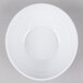 A white Elite Global Solutions oblong melamine bowl with a swirl pattern.