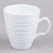 A close-up of a white Elite Global Solutions melamine mug with a handle.