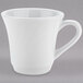 A Tuxton bright white china tall cup with an embossed rim and handle.