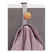 A metallic gray Alba cubicle garment hook with two hooks holding a purple coat.