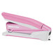 A pink and white Bostitch PaperPro stapler.