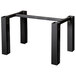 A BFM Seating black metal rectangular table base with two legs.
