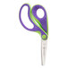 A close-up of a pair of Westcott Ergo Jr. kids scissors with bent handles, one purple and one green.