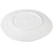 An off white Elite Global Solutions Della Terra melamine plate with a circular pattern.