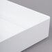 A white rectangular melamine tray with two compartments.