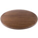 A BFM Seating round wooden table top with an Autumn Ash design.