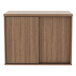 A brown wooden Alera low storage cabinet with sliding doors.