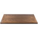 A BFM Seating rectangular wood table top with a dark brown finish.