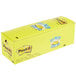 A yellow box with blue text reading "3M Post-It Canary Yellow Sticky Note Pads 24/Pack"