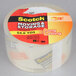 A roll of 3M Scotch long-lasting moving and storage tape with a red and yellow label.