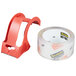A roll of 3M Scotch clear packaging tape with a red dispenser.
