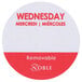 A white circular label with red text that says "Wednesday"