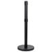 A black metal Aarco crowd control stanchion with a round base and black pole.