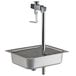 A Fisher metal pedestal with a glass filler on a metal pole over a metal sink.