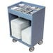 A slate blue Cambro tray and silverware cart full of utensils and forks.