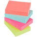 A stack of Post-It notes in various colors.