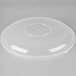 A close up of a clear plastic Fineline catering bowl lid with a round top.