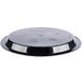 A black circular plastic catering tray lid with text on it.