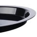 A close up of a Fineline black plastic high rim catering tray.