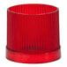 A red plastic cylinder with a white lid.